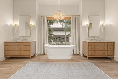 Nestled on a sprawling one-acre lot within the prestigious gated - photo 21
