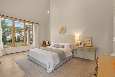 Nestled on a sprawling one-acre lot within the prestigious gated - photo 23