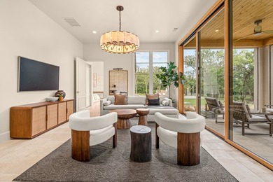 Nestled on a sprawling one-acre lot within the prestigious gated - photo 24
