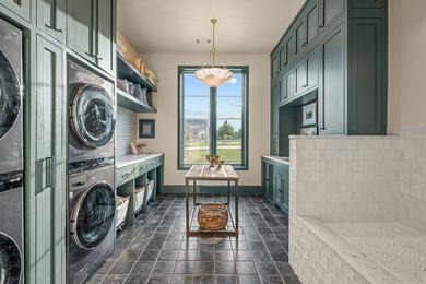 Nestled on a sprawling one-acre lot within the prestigious gated - photo 25