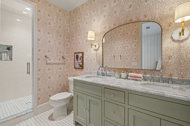 Nestled on a sprawling one-acre lot within the prestigious gated - photo 28