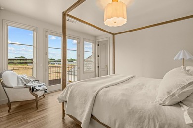 Nestled on a sprawling one-acre lot within the prestigious gated - photo 30