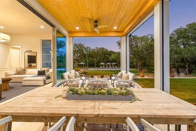 Nestled on a sprawling one-acre lot within the prestigious gated - photo 33