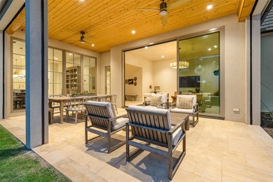 Nestled on a sprawling one-acre lot within the prestigious gated - photo 35