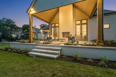 Nestled on a sprawling one-acre lot within the prestigious gated - photo 37
