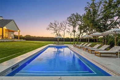 Nestled on a sprawling one-acre lot within the prestigious gated - photo 39