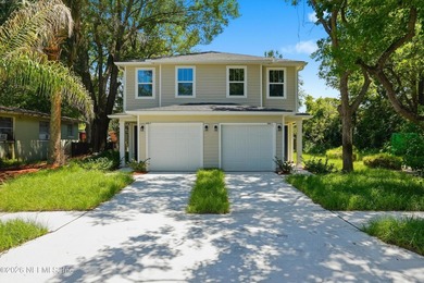 Newly built in 2026,, this duplex offers an excellent - photo 1