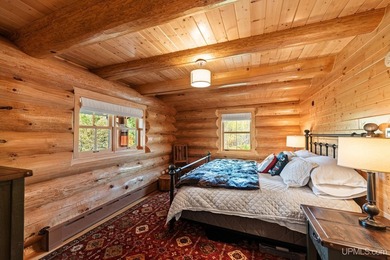 Escape to your own private paradise in this stunning log home - photo 14