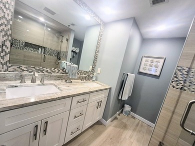 Experience coastal living at its finest in magnificently updated