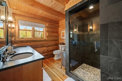 Escape to your own private paradise in this stunning log home - photo 15