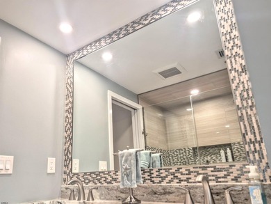 Experience coastal living at its finest in magnificently updated