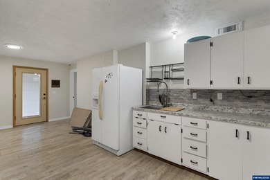 Great Albany home with tons of updates! Kitchen fully gutted and