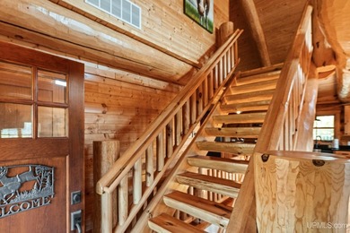 Escape to your own private paradise in this stunning log home - photo 17