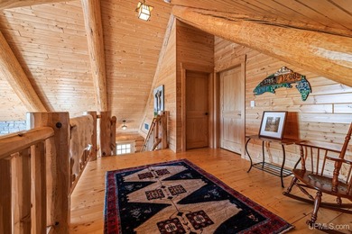 Escape to your own private paradise in this stunning log home - photo 18