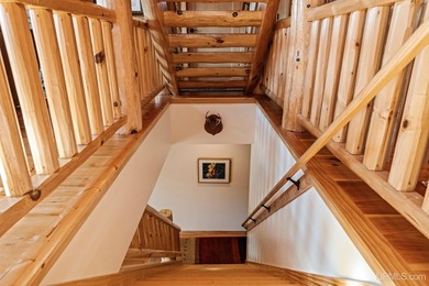 Escape to your own private paradise in this stunning log home - photo 23