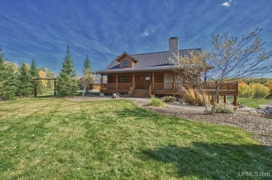 Escape to your own private paradise in this stunning log home - photo 35