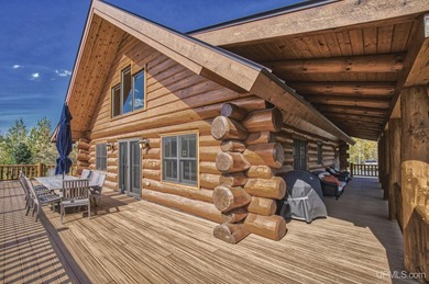 Escape to your own private paradise in this stunning log home - photo 38