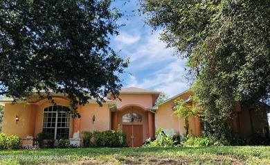 This 3 bedroom, 3 bathroom, 2 car garage pool home sits on over - photo 1