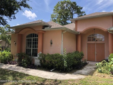 This 3 bedroom, 3 bathroom, 2 car garage pool home sits on over - photo 3