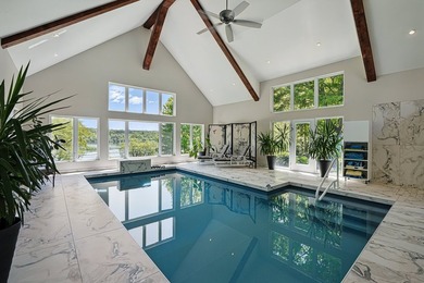 North Hatley, face au lac Massawippi. Adresse prestigieuse au - photo 8
