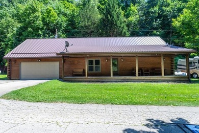 Welcome to your peaceful log home retreat! Nestled in a serene - photo 1
