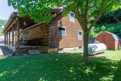 Welcome to your peaceful log home retreat! Nestled in a serene - photo 2