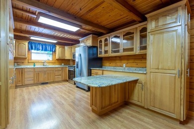 Welcome to your peaceful log home retreat! Nestled in a serene - photo 4