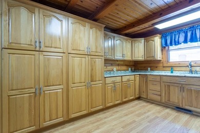 Welcome to your peaceful log home retreat! Nestled in a serene - photo 5