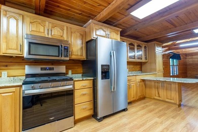 Welcome to your peaceful log home retreat! Nestled in a serene - photo 7