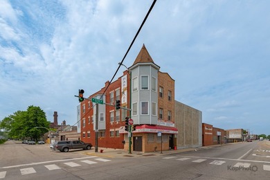 Massive 5,780 sq ft mixed-use building ideally located on busy - photo 1