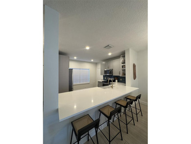 Beautifully renovated townhome in the desirable neighborhood of - photo 6