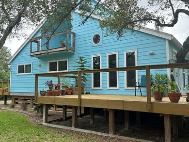 Tucked away on 2 private, oak-studded acres, this peaceful - photo 1