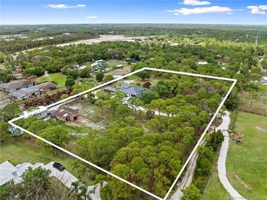 Discover a rare 5-acre equestrian estate just minutes from - photo 1