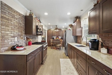 WOW! This 4 bed, 2.5 bath colonial in one of Brick's best - photo 11