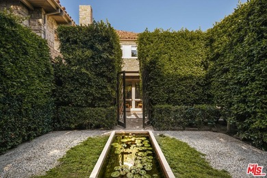 Hidden behind layers of mature landscaping and approached - photo 15