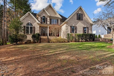 Charming brick home featuring a desirable floor plan with the - photo 2