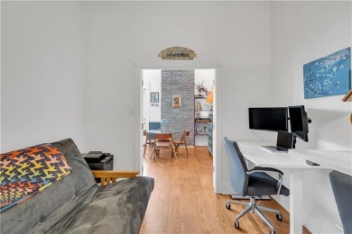 Uptown Historic Schoolhouse Condo with Pool and ParkingSituated