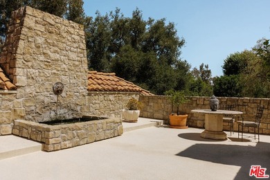 Hidden behind layers of mature landscaping and approached - photo 26