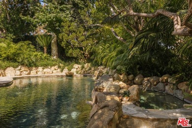 Hidden behind layers of mature landscaping and approached - photo 33