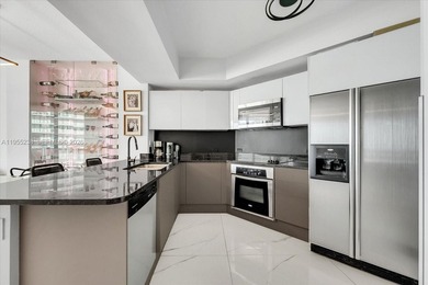 This 1-bedroom, 1.5-bath residence at Platinum Condominium