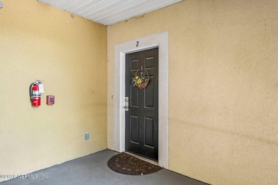 Welcome to this beautifully maintained 3-bedroom, 2-bath condo - photo 1