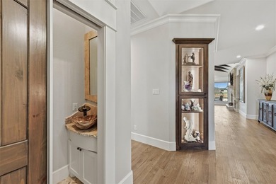 Welcome to refined lakeside living in the prestigious gated - photo 12