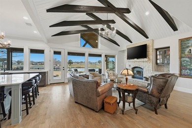 Welcome to refined lakeside living in the prestigious gated - photo 15