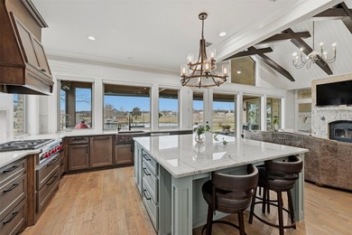 Welcome to refined lakeside living in the prestigious gated - photo 18