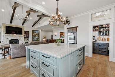 Welcome to refined lakeside living in the prestigious gated - photo 19