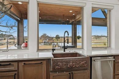 Welcome to refined lakeside living in the prestigious gated - photo 21