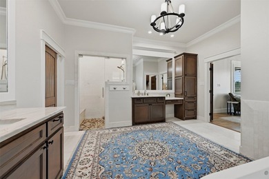 Welcome to refined lakeside living in the prestigious gated - photo 27