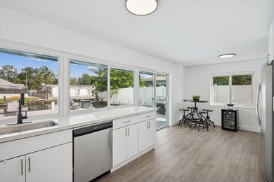 All remodeled with a new open kitchen and large impact sliders - photo 2