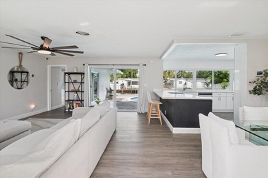 All remodeled with a new open kitchen and large impact sliders - photo 5