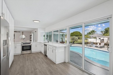 All remodeled with a new open kitchen and large impact sliders - photo 8